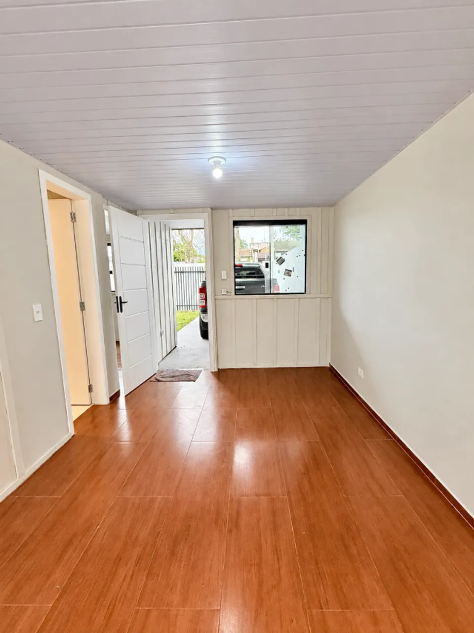 Wood or laminate floors in a 3-bedroom house, 55 m² — photo 4