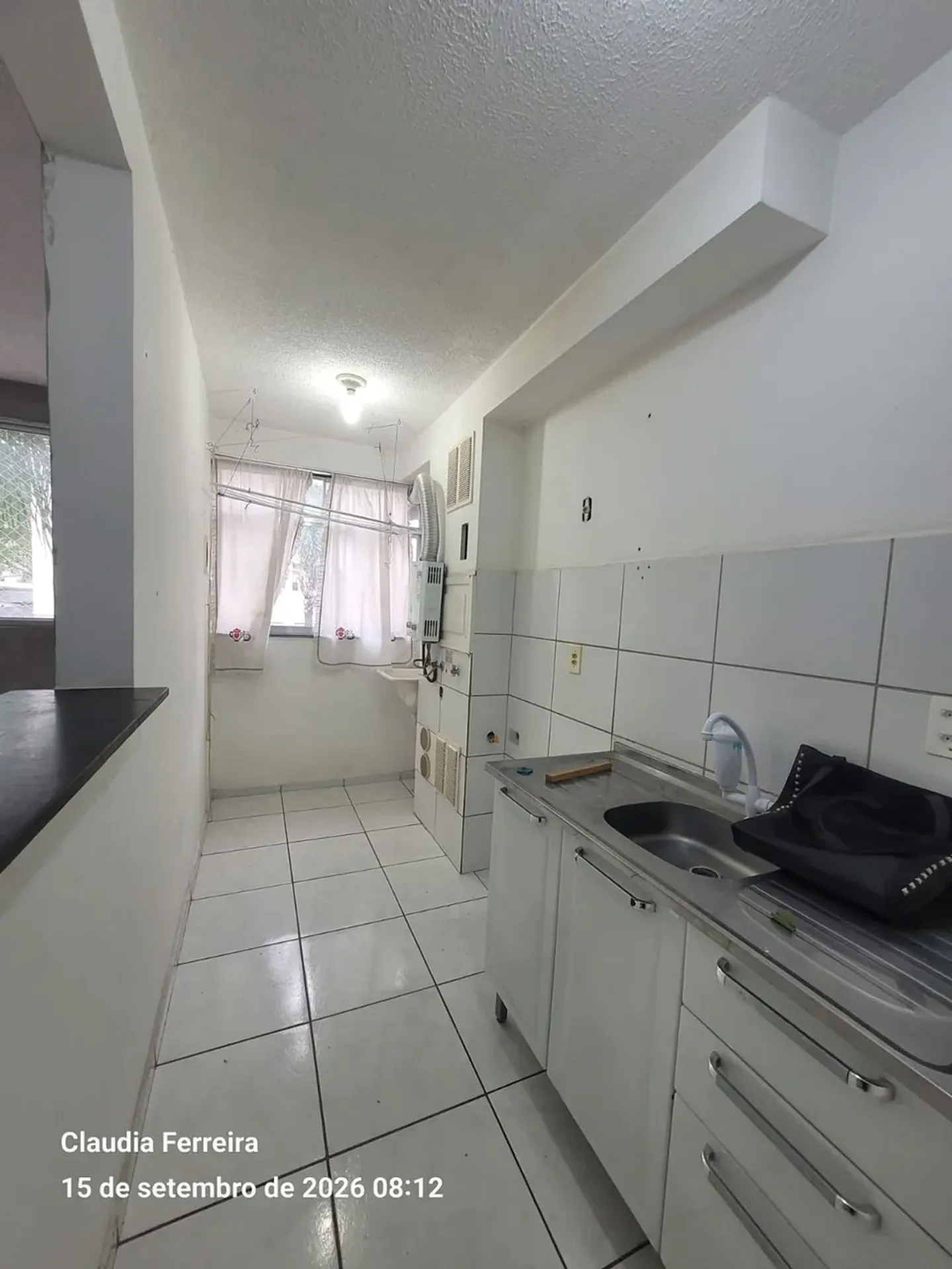 2-bedroom apartment in a building with a pool — photo 2