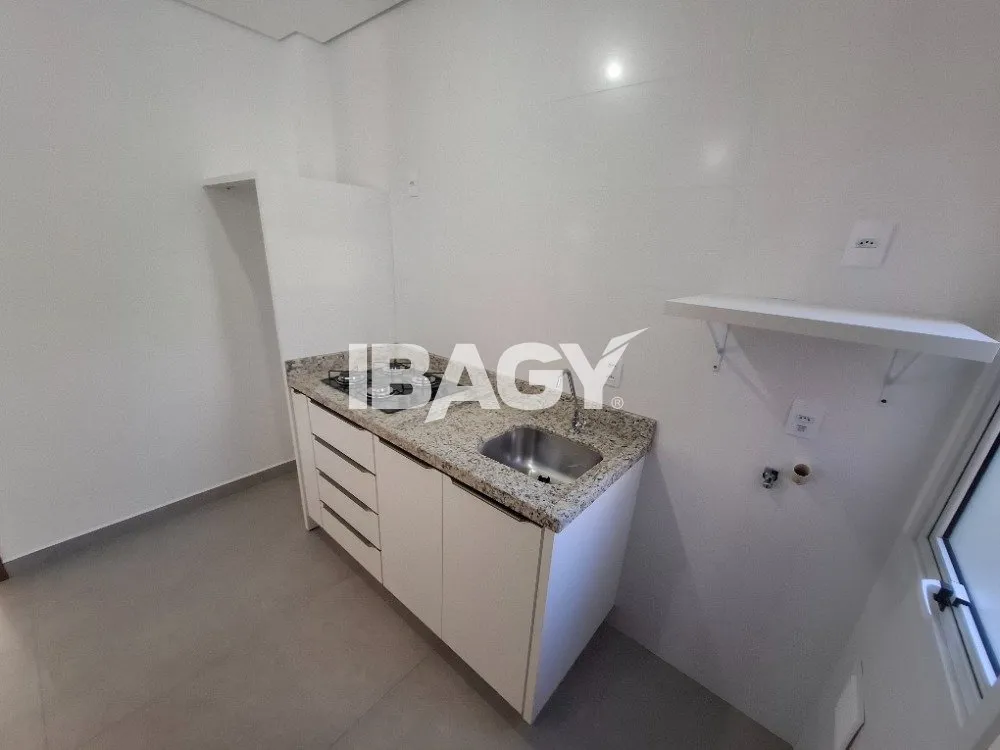 1-bedroom apartment with gas stove and range hood — photo 4