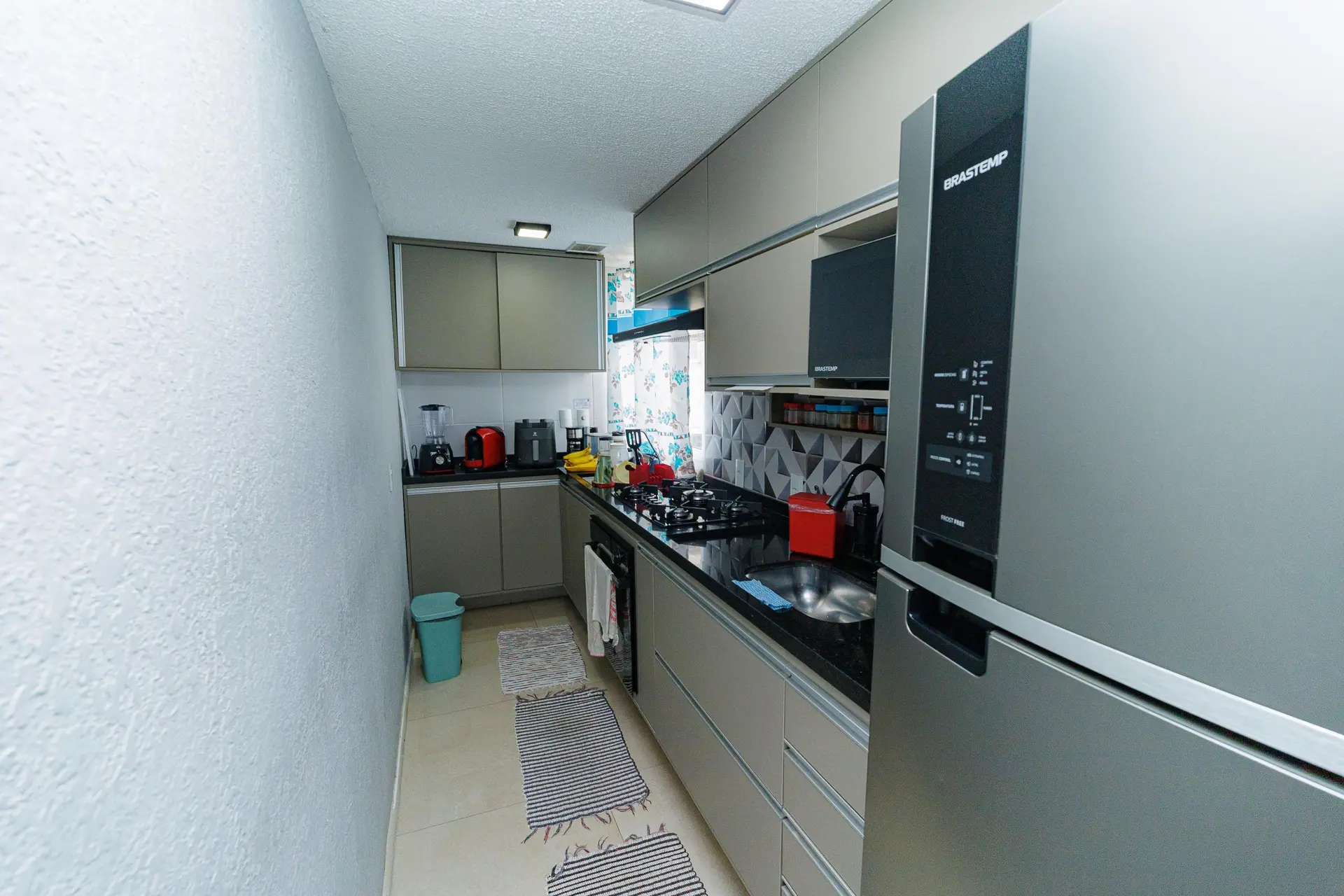 2-bedroom apartment in a building with a pool — photo 2