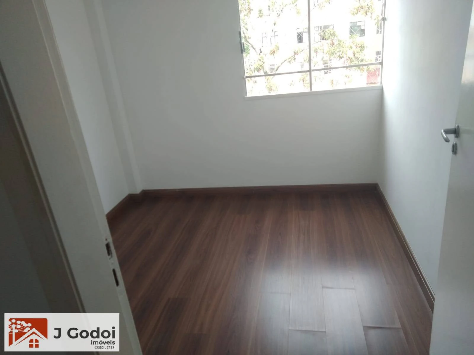 2-bedroom apartment with wood or laminate floors — photo 2