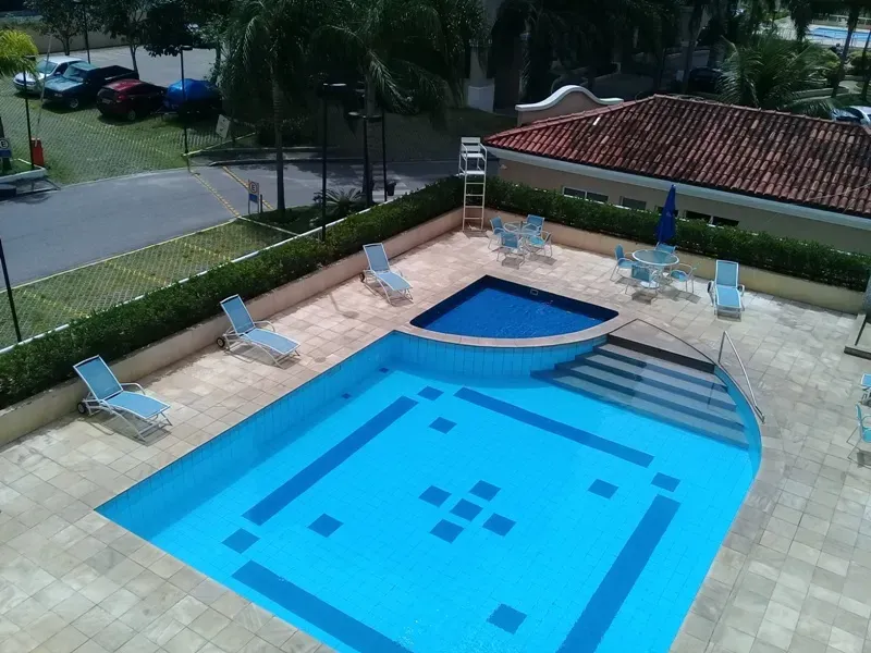 2-bedroom apartment in a building with a pool — photo 5