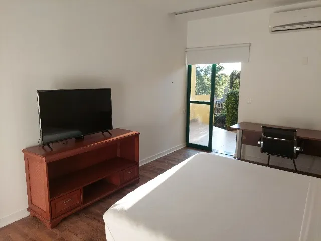 Apartamento de 1 quarto com varanda e área de lavanderia — photo 9