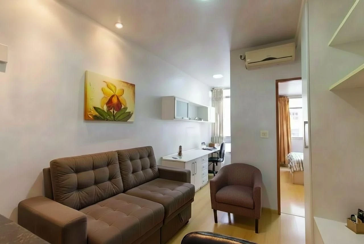 Furnished 1-bedroom apartment with a laundry area — photo 14