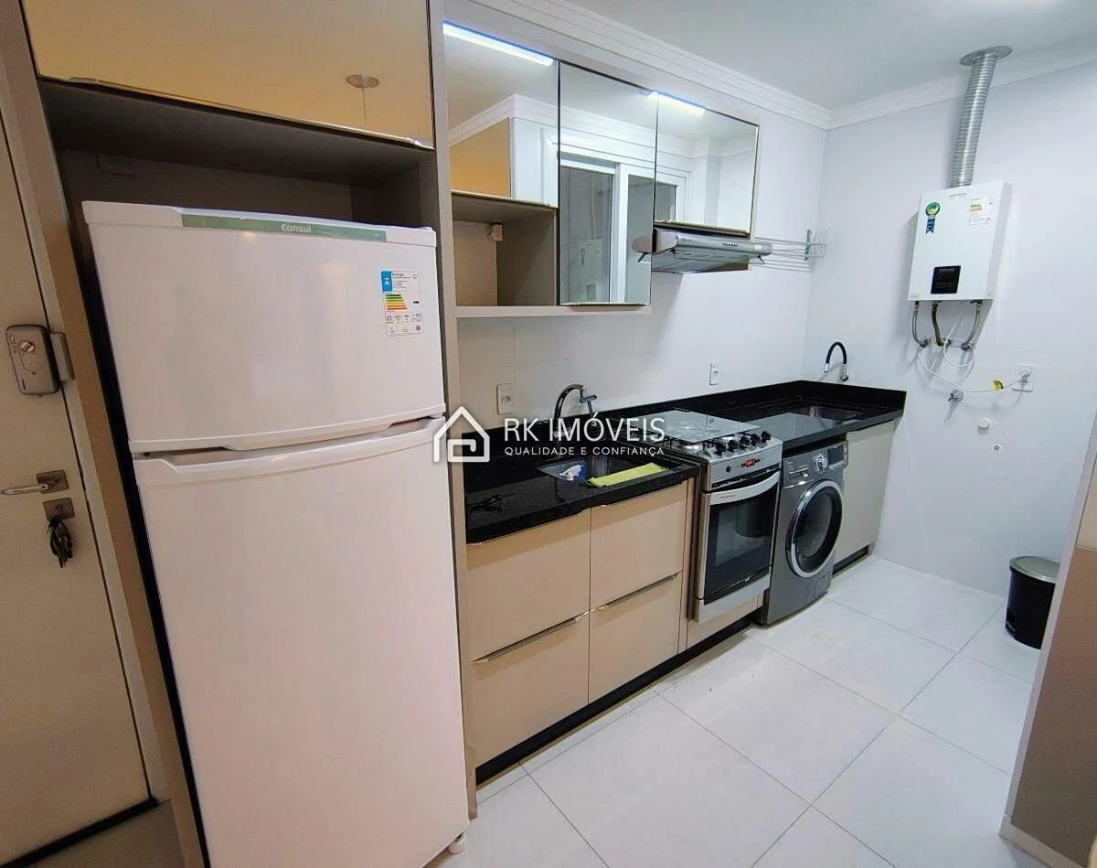 One-bedroom apartment in a building with a pool — photo 2