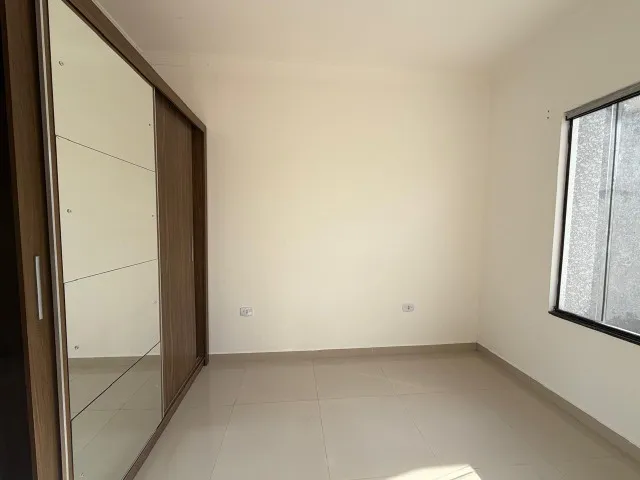 2-bedroom apartment in a building with a pool — photo 3