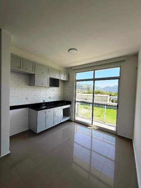 1-bedroom apartment with open-plan kitchen and parking — photo 2