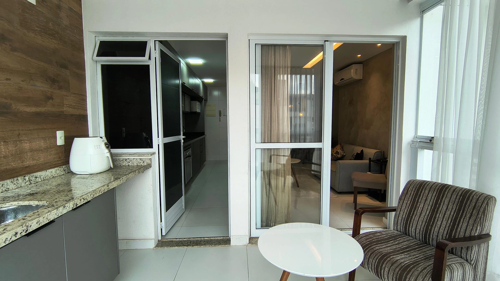 2-bedroom apartment with an enclosed, floor-to-ceiling balcony — photo 29
