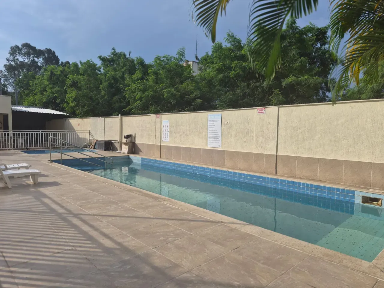 2-bedroom apartment in a building with a pool — photo 25