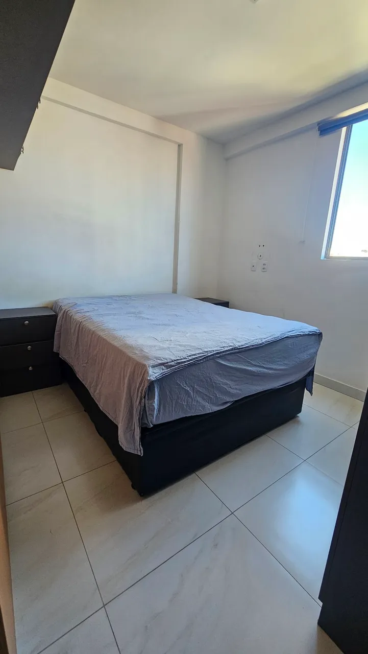 2-bedroom apartment in a building with a pool