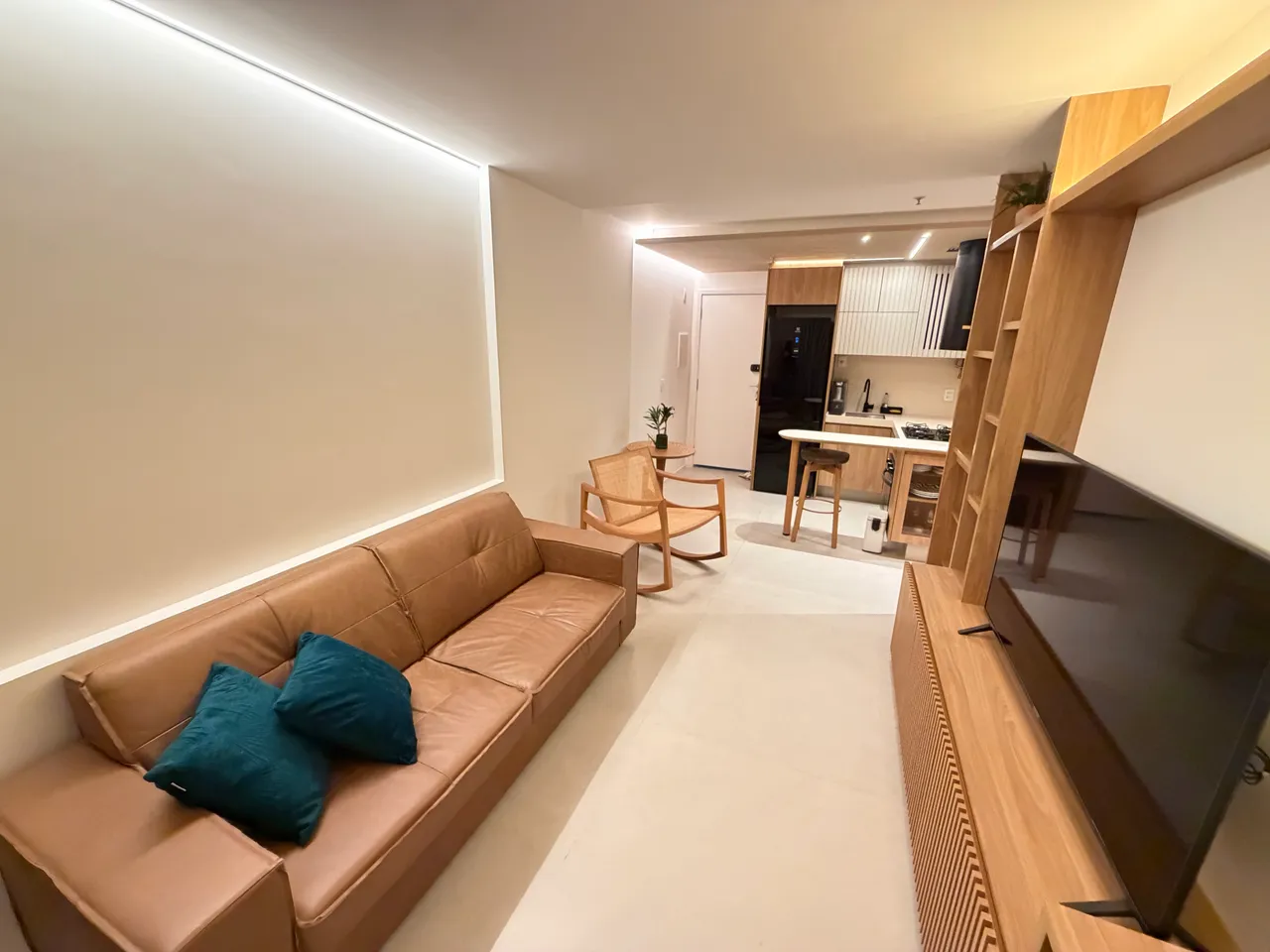 Furnished apartment with open-plan kitchen and balcony