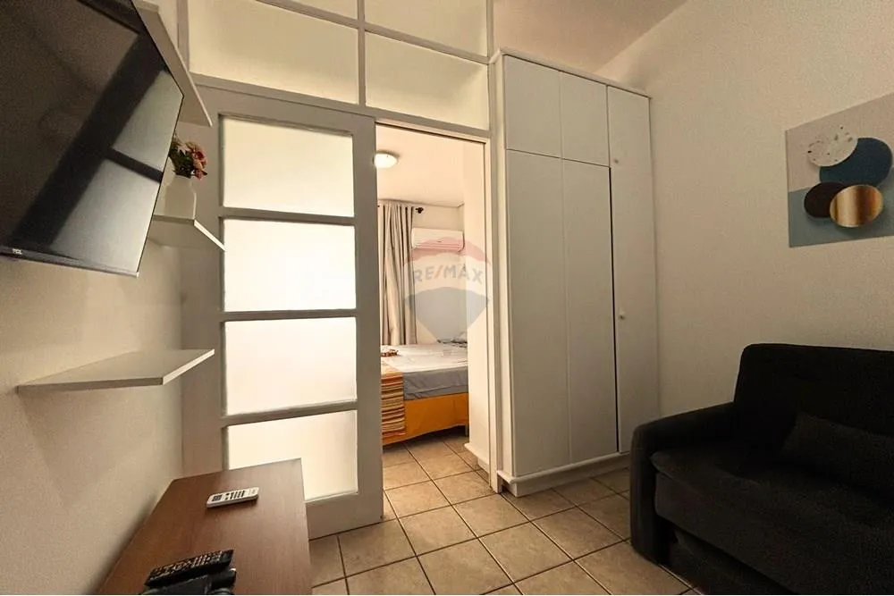 Furnished 1-bedroom apartment with balcony and water view — photo 9