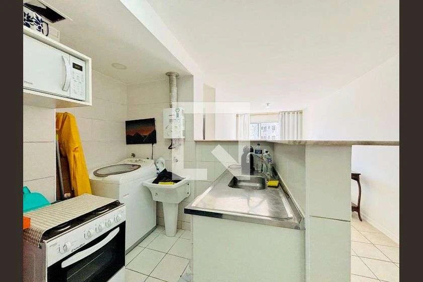 1-bedroom apartment with an open kitchen and balcony — photo 14