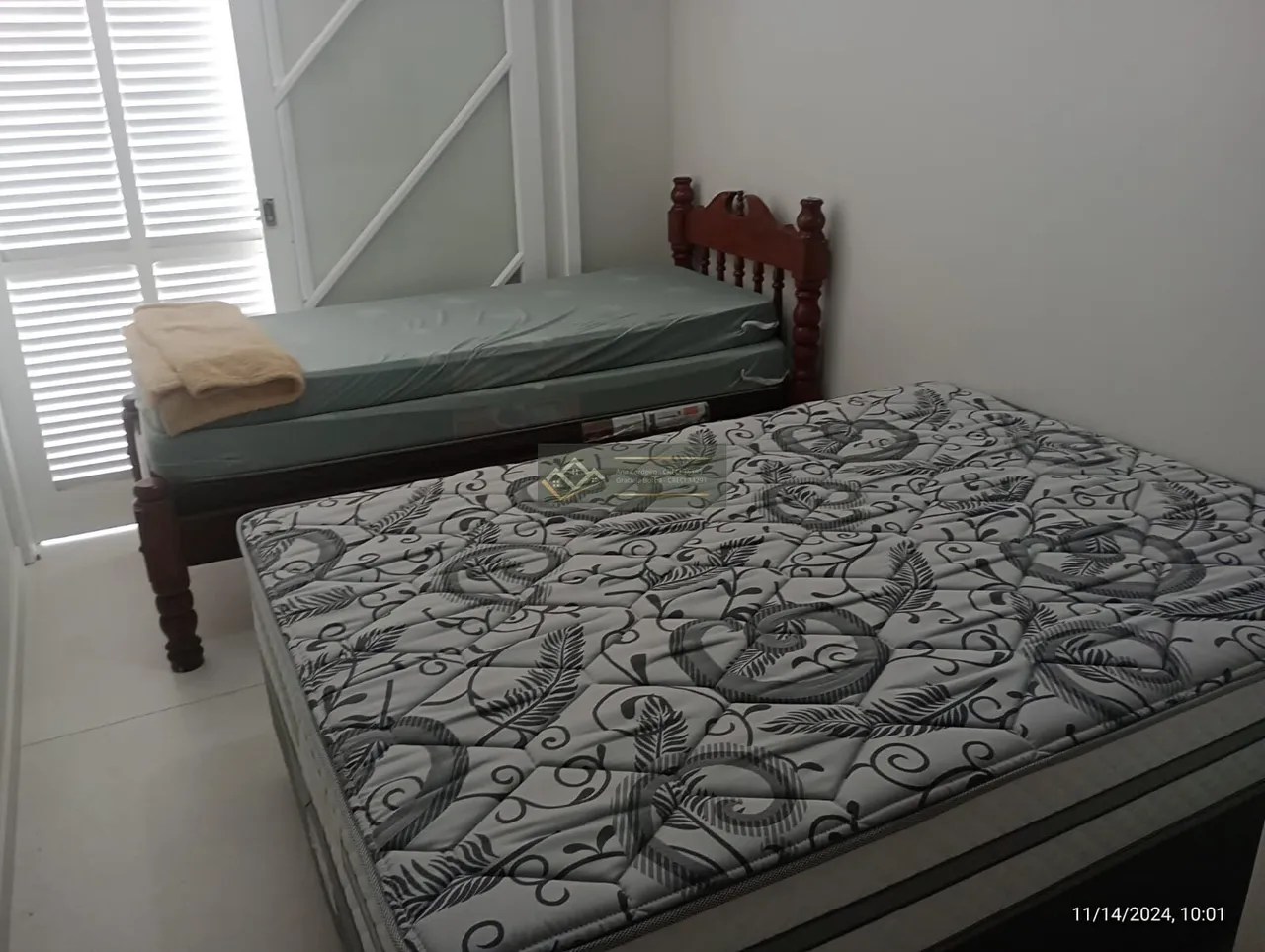 2-bedroom apartment in a building with a pool — photo 10