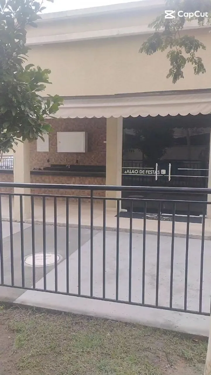 2-bedroom apartment in a building with a pool — photo 12