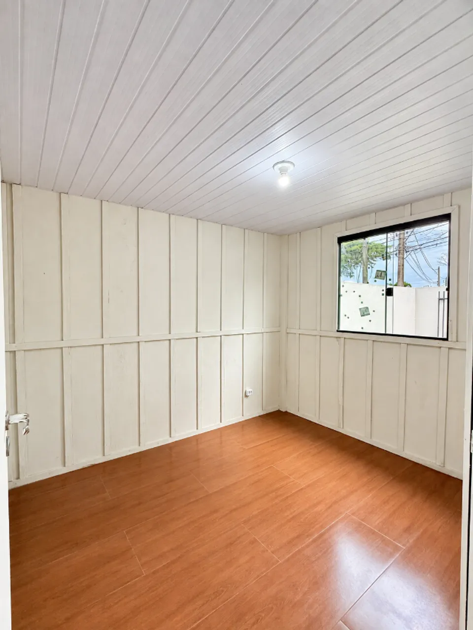 Wood or laminate floors in a 3-bedroom house, 55 m² — photo 17