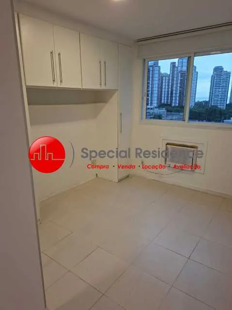 2-bedroom apartment in a building with a pool — photo 3