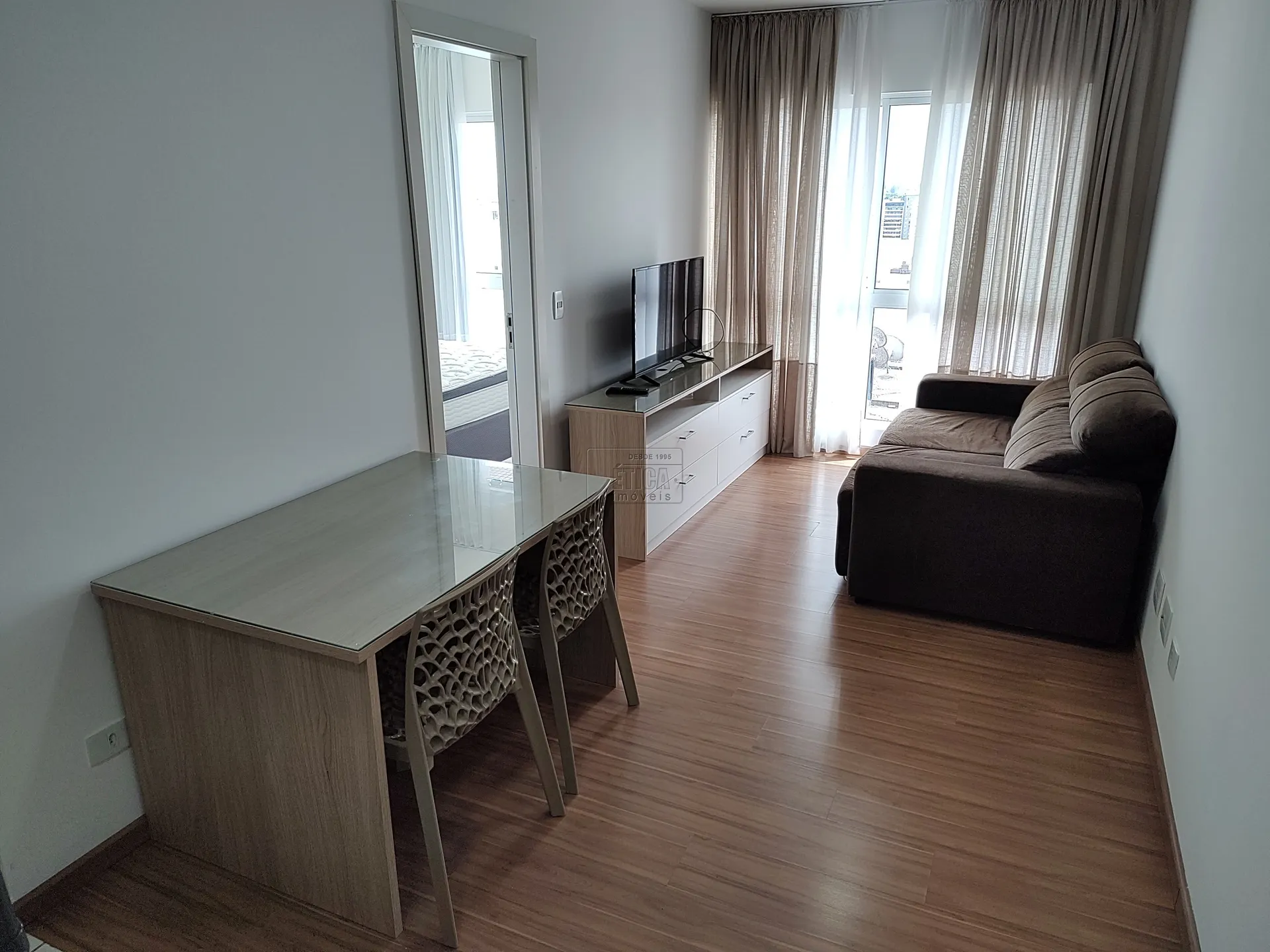 One-bedroom apartment in a building with a gym