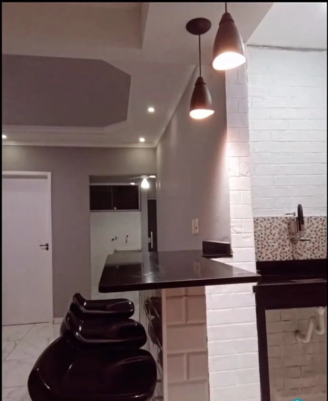 Apartamento com cozinha integrada e sala em plano aberto — photo 3