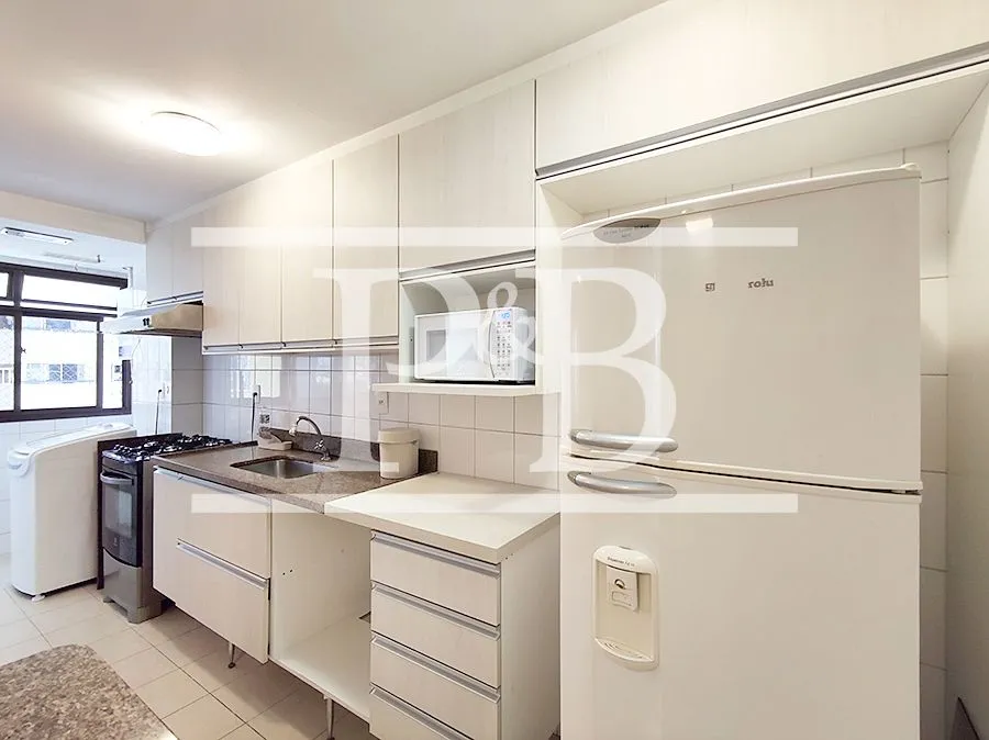 2-bedroom apartment in a building with a pool — photo 2