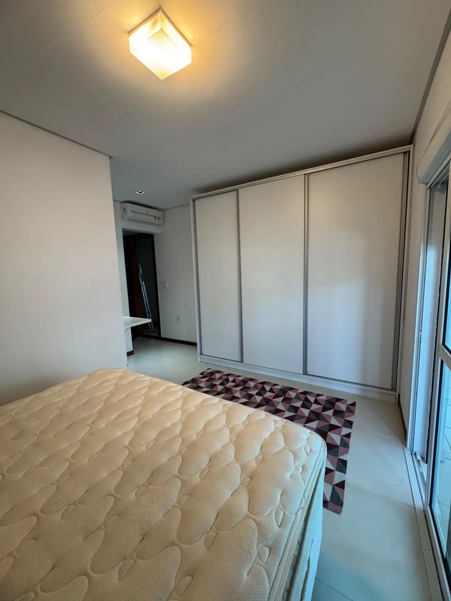 2-bedroom apartment in a building with a pool — photo 18