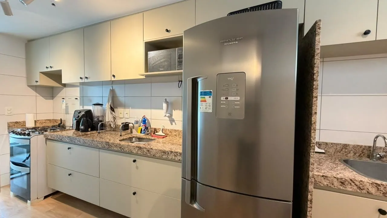 2-bedroom apartment in a building with a pool — photo 17