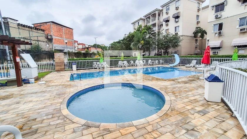 2-bedroom apartment in a building with a pool — photo 22