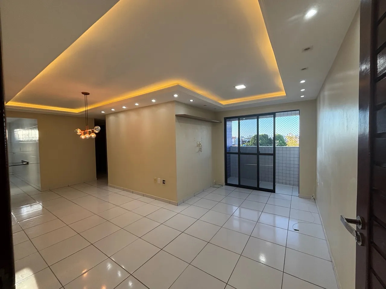 3-bedroom apartment in a building with a pool