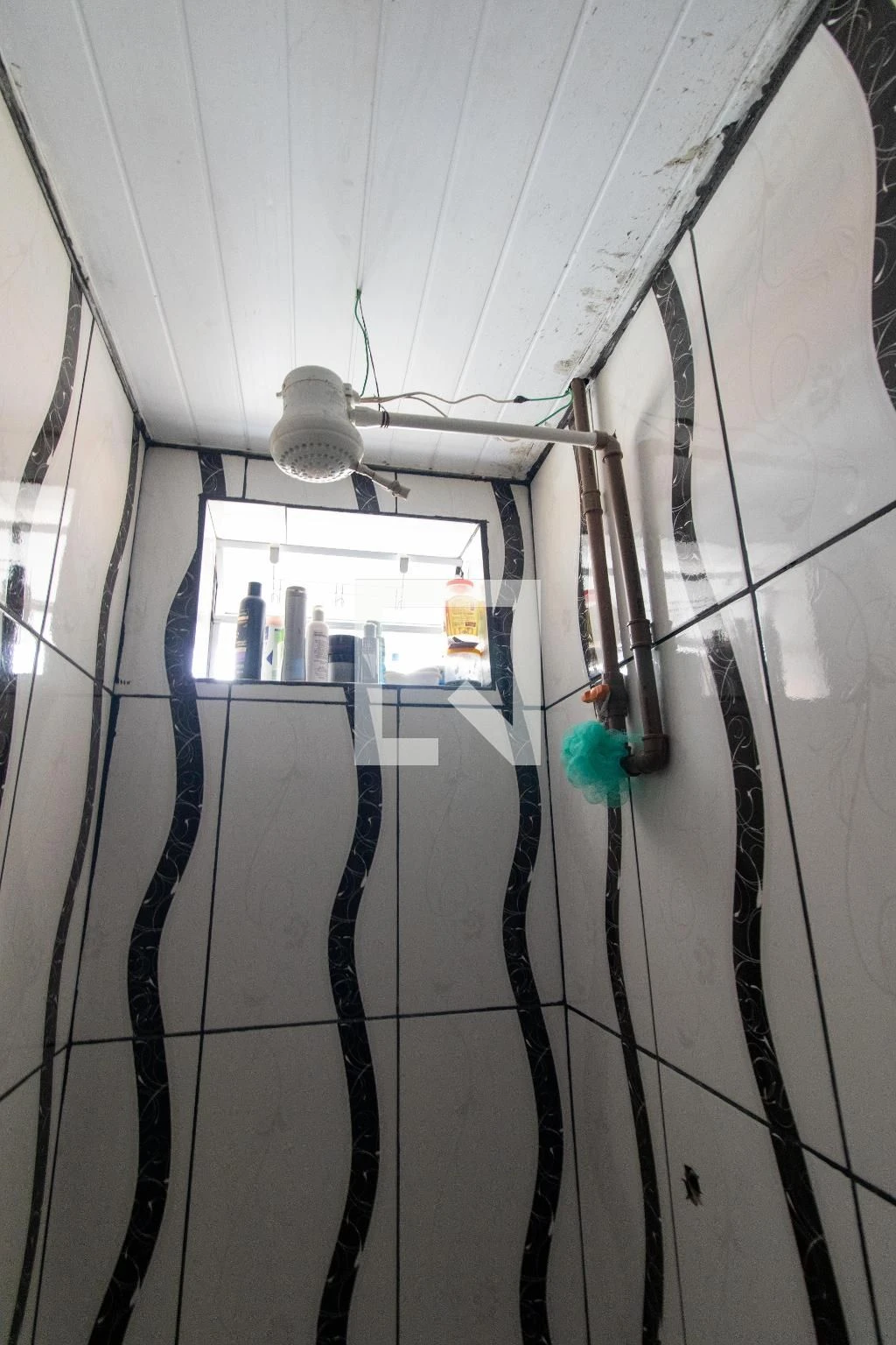 One-bedroom house with a washing machine in Curitiba