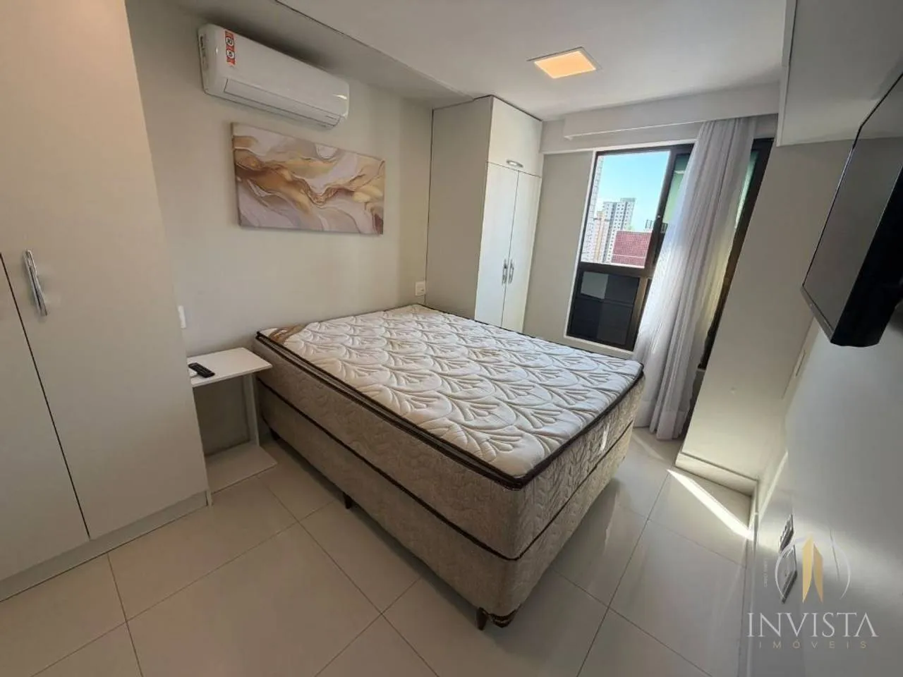 2-bedroom apartment in a building with a pool — photo 7