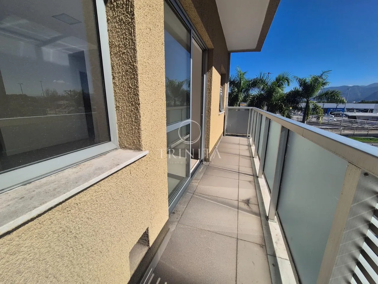 2-bedroom 2-bath apartment with open-plan kitchen and balcony — photo 3