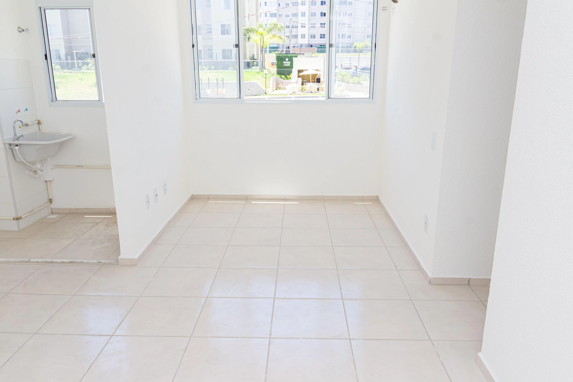 2-bedroom apartment in a building with a pool — photo 2