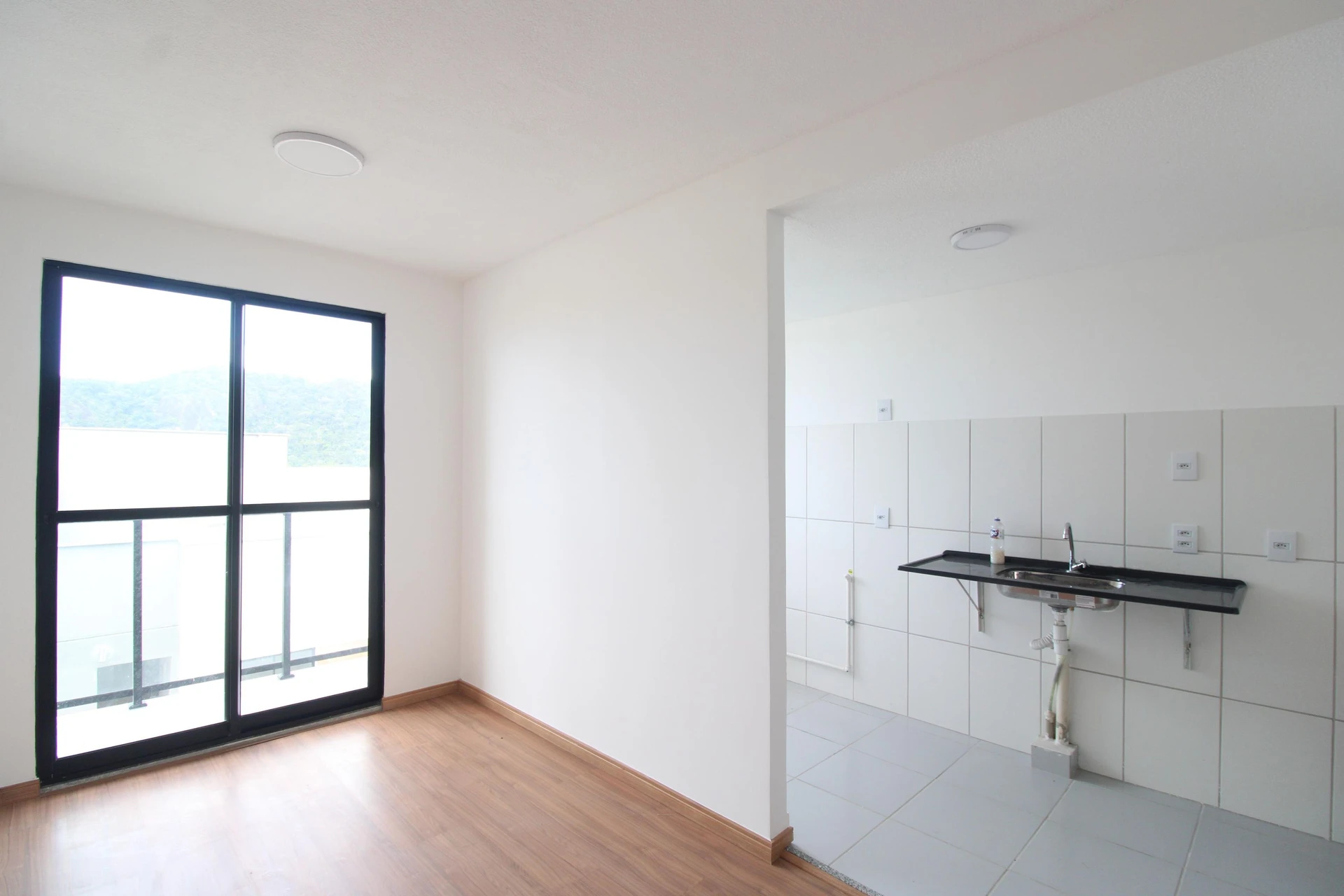 Unfurnished 2-bedroom apartment with balcony and private garden — photo 2