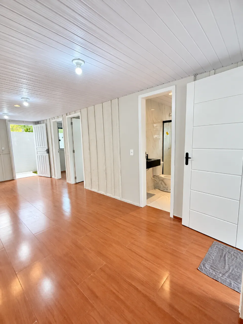 Wood or laminate floors in a 3-bedroom house, 55 m² — photo 16