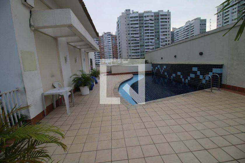 2-bedroom apartment in a building with a pool — photo 17