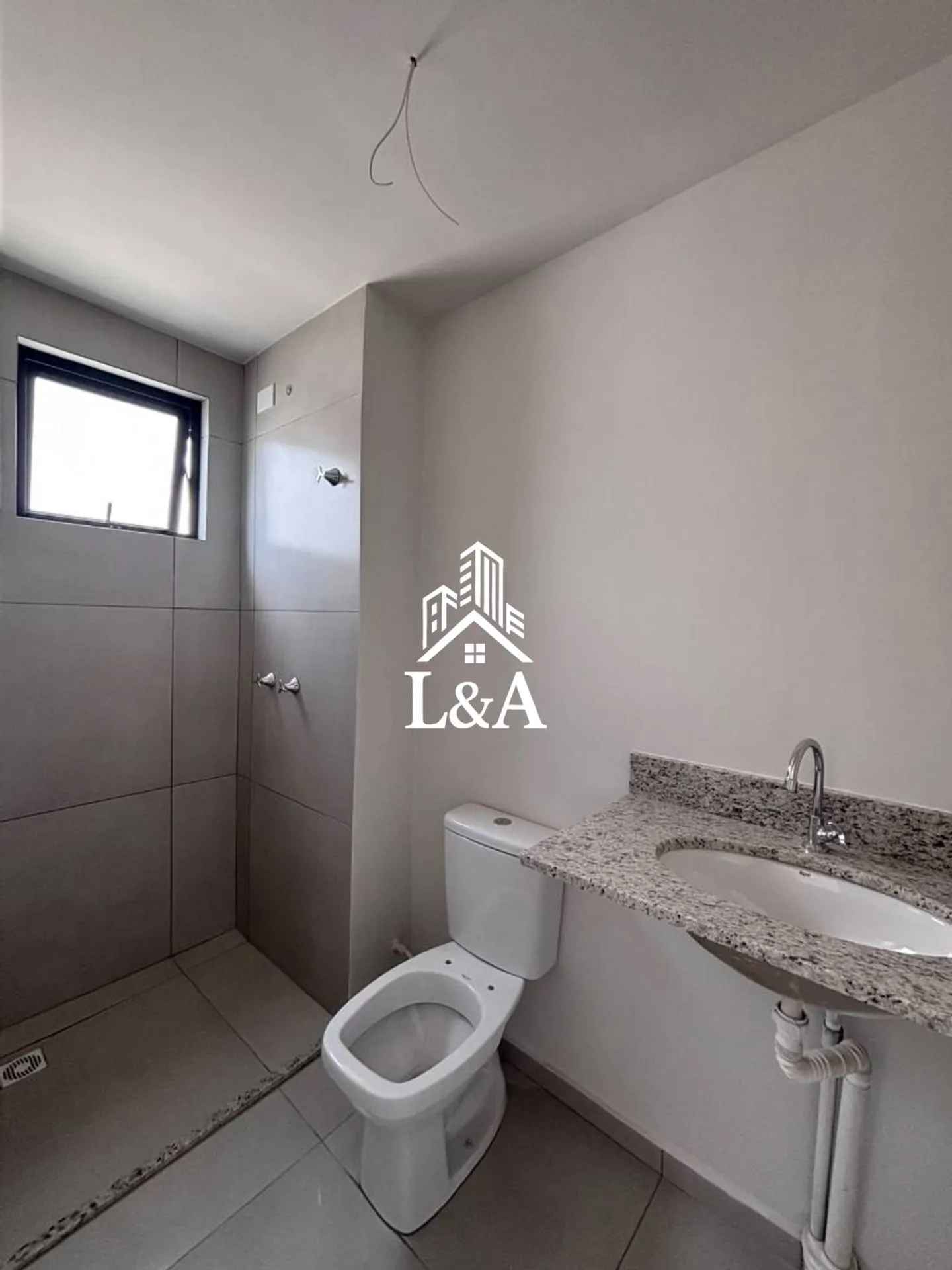 3-bedroom apartment in a building with a pool