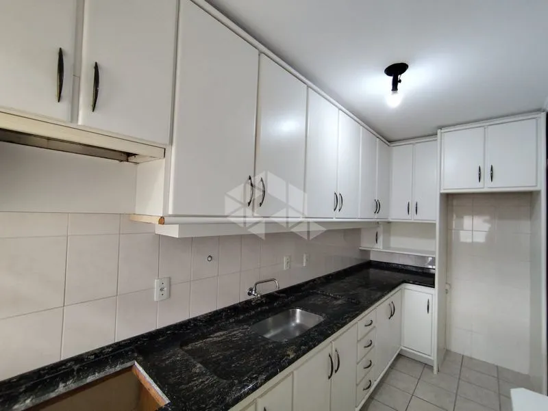 2-bedroom apartment in a building with a pool — photo 5