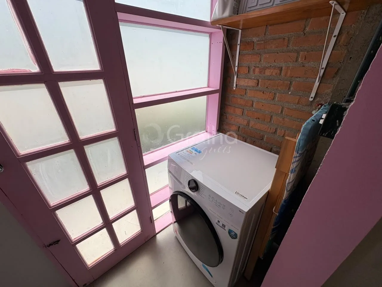 2-bedroom house with a washing machine — photo 16
